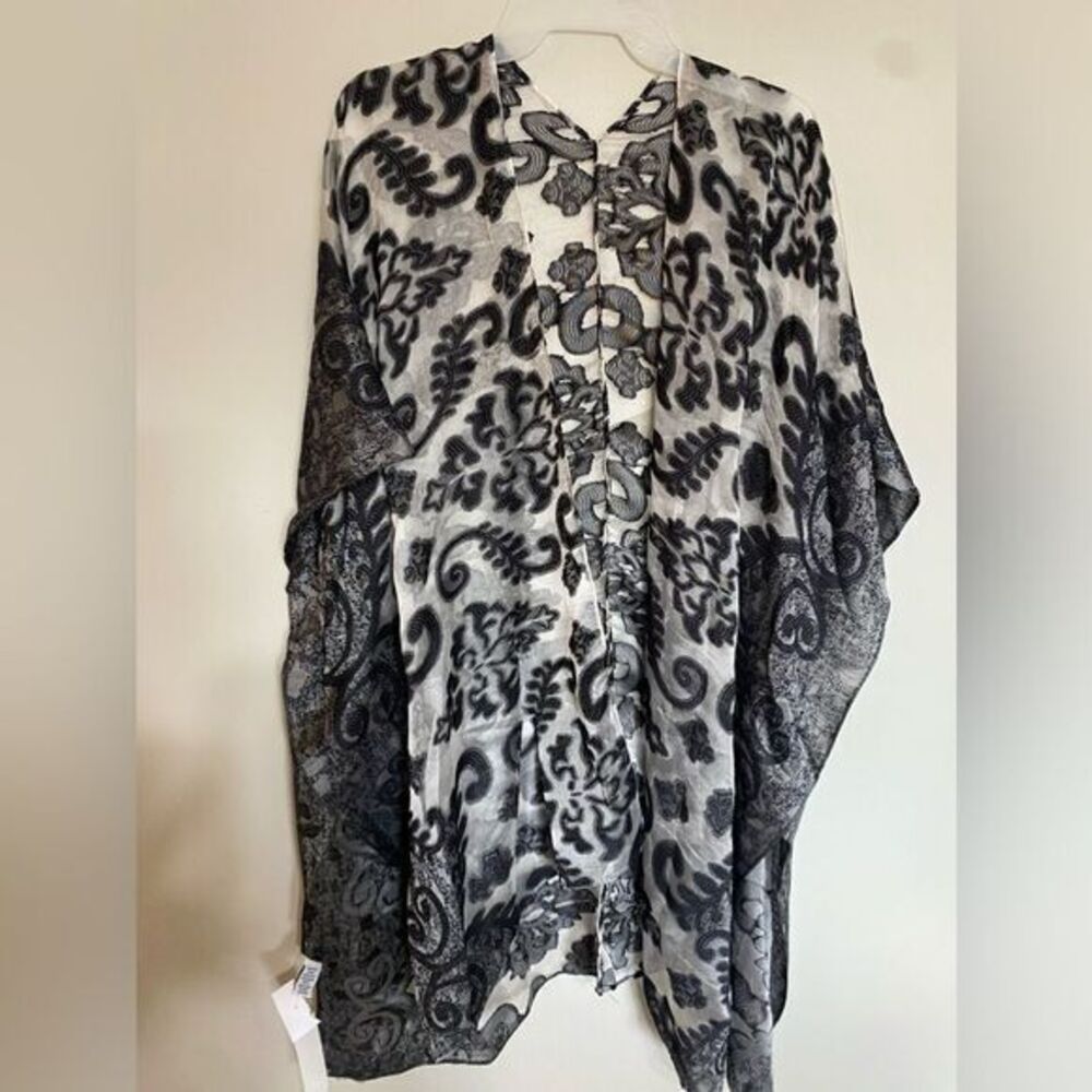 - New women’s, sheer vest, black, and white sea description‎